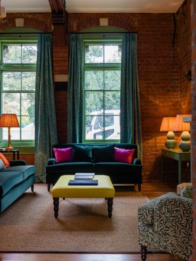 The Observatory Hotel Крайстчерч Екстер'єр фото The interior of the former stable block